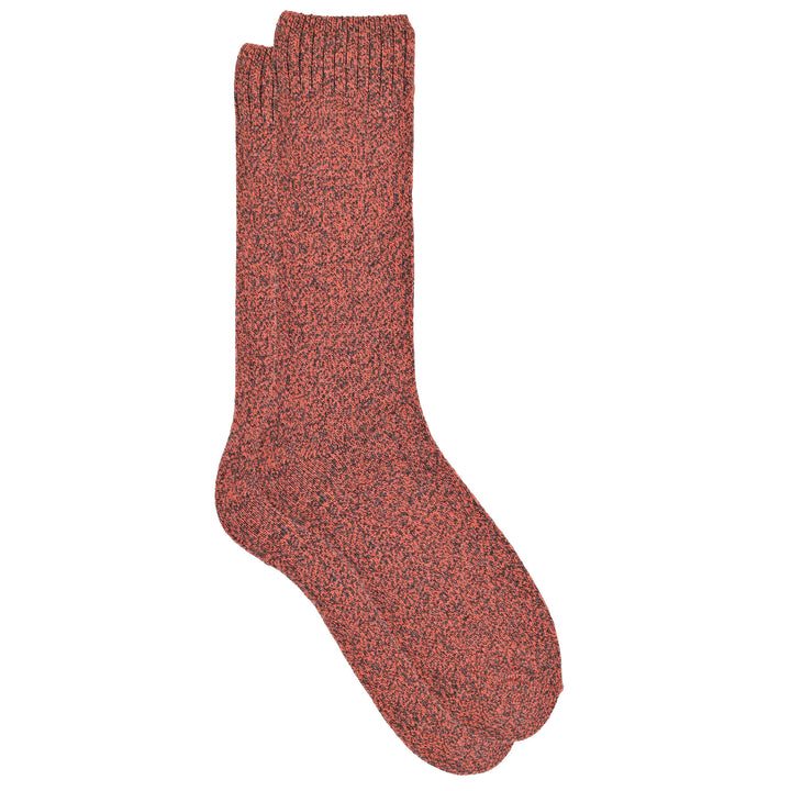 Red knitted sock on a white background
