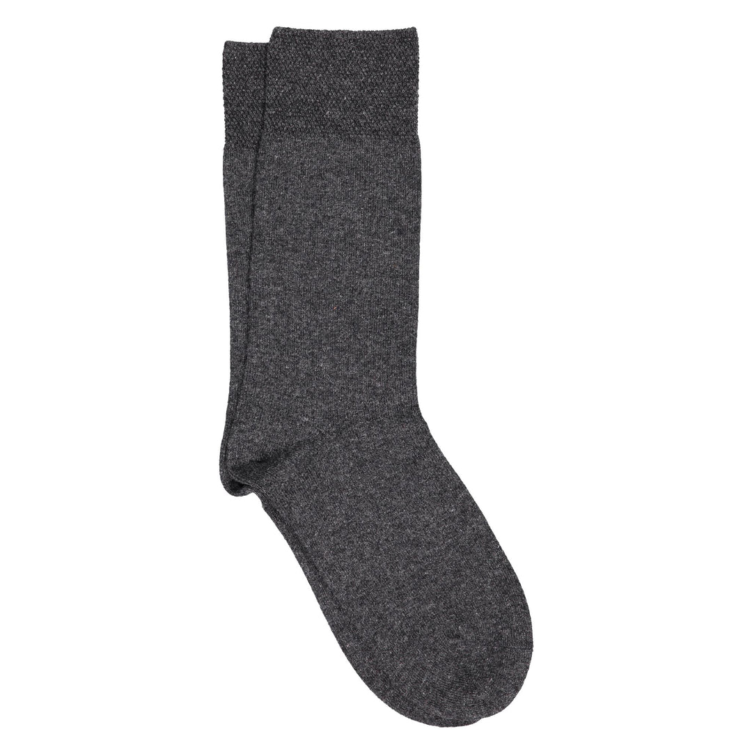 A pair of grey crew socks with a pique cuff.