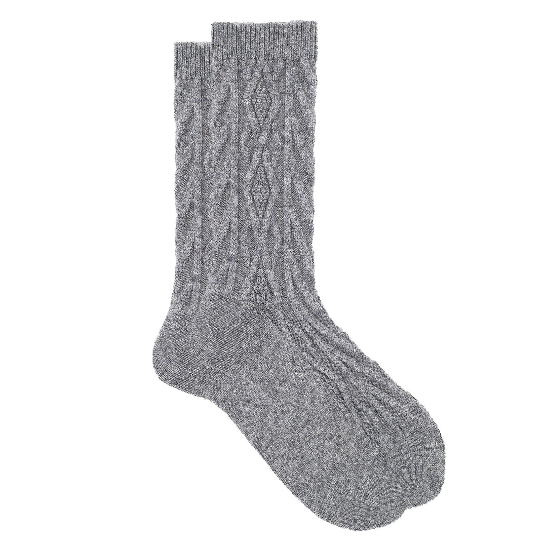 A pair of grey cashmere silk jacquard crew socks with a cozy knit pattern.