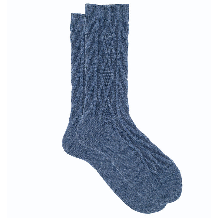 A pair of blue cashmere silk jacquard crew socks with a cozy knit pattern.