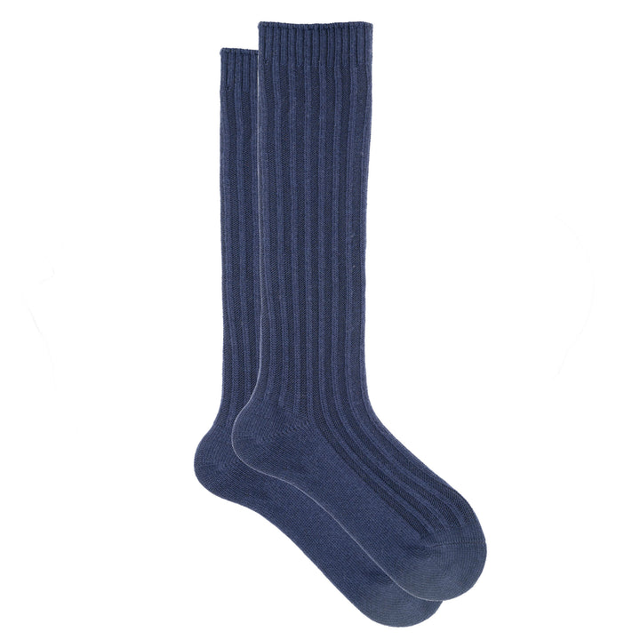 Pair of blue knee-high socks on a white background