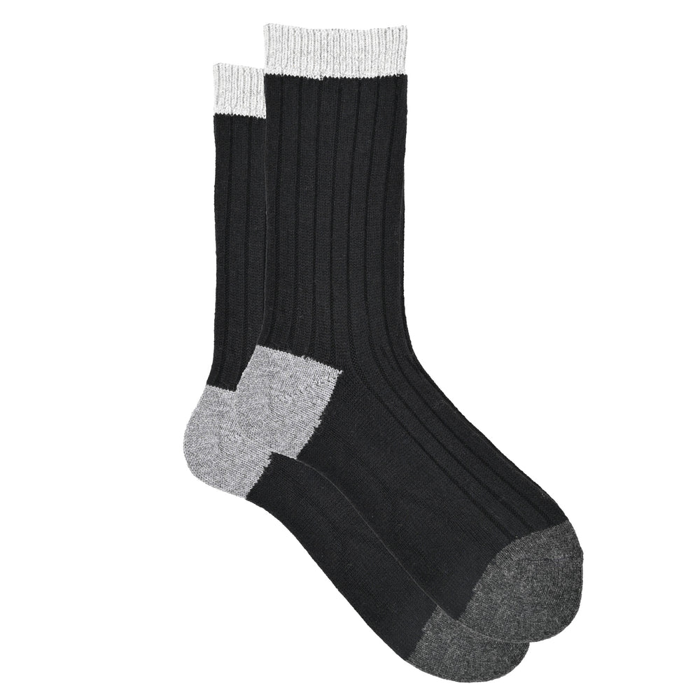 A pair of color block ribbed knit socks, featuring dark gray, and a comfortable cuff.