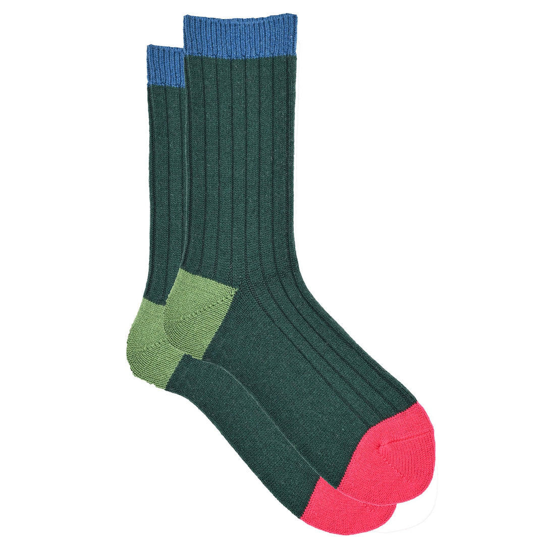 A pair of color block ribbed knit socks, featuring green with red, pink, and light blue blocks, and a comfortable cuff.