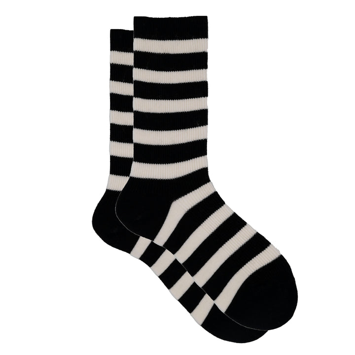 A pair of cozy cashmere silk striped ribbed crew socks in black and beige color pattern.