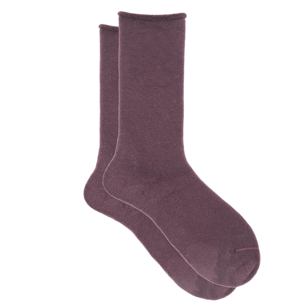 A pair of purple Tencel cushion terry socks with a seamless toe and hand-linked design.