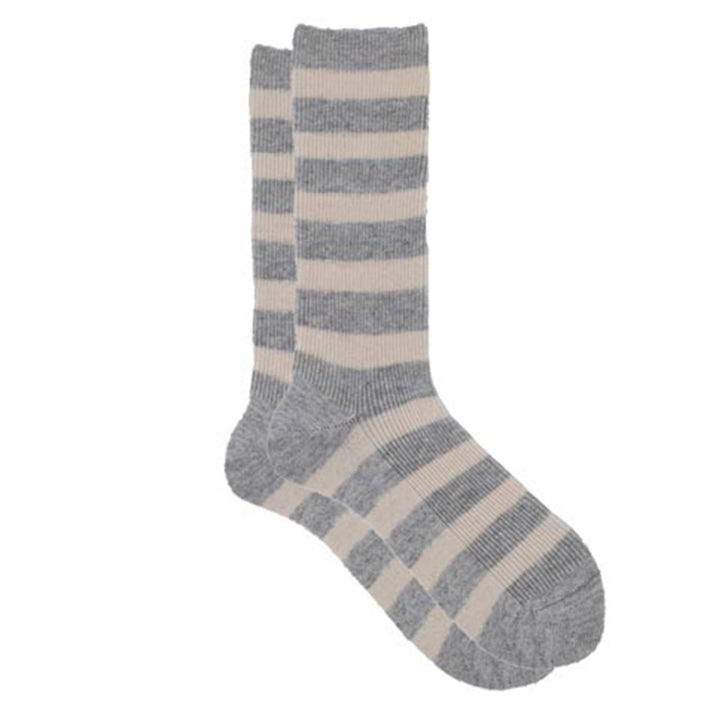 beige and navy striped sock on a white background