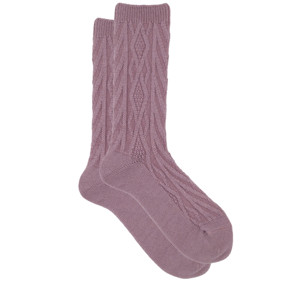 A pair of pink cashmere silk jacquard crew socks with a cozy knit pattern.