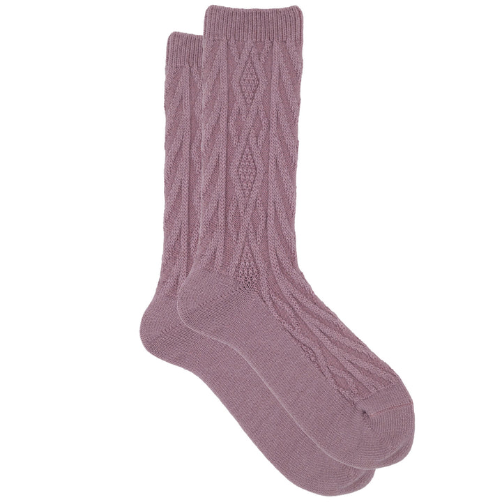 A pair of pink cashmere silk jacquard crew socks with a cozy knit pattern.