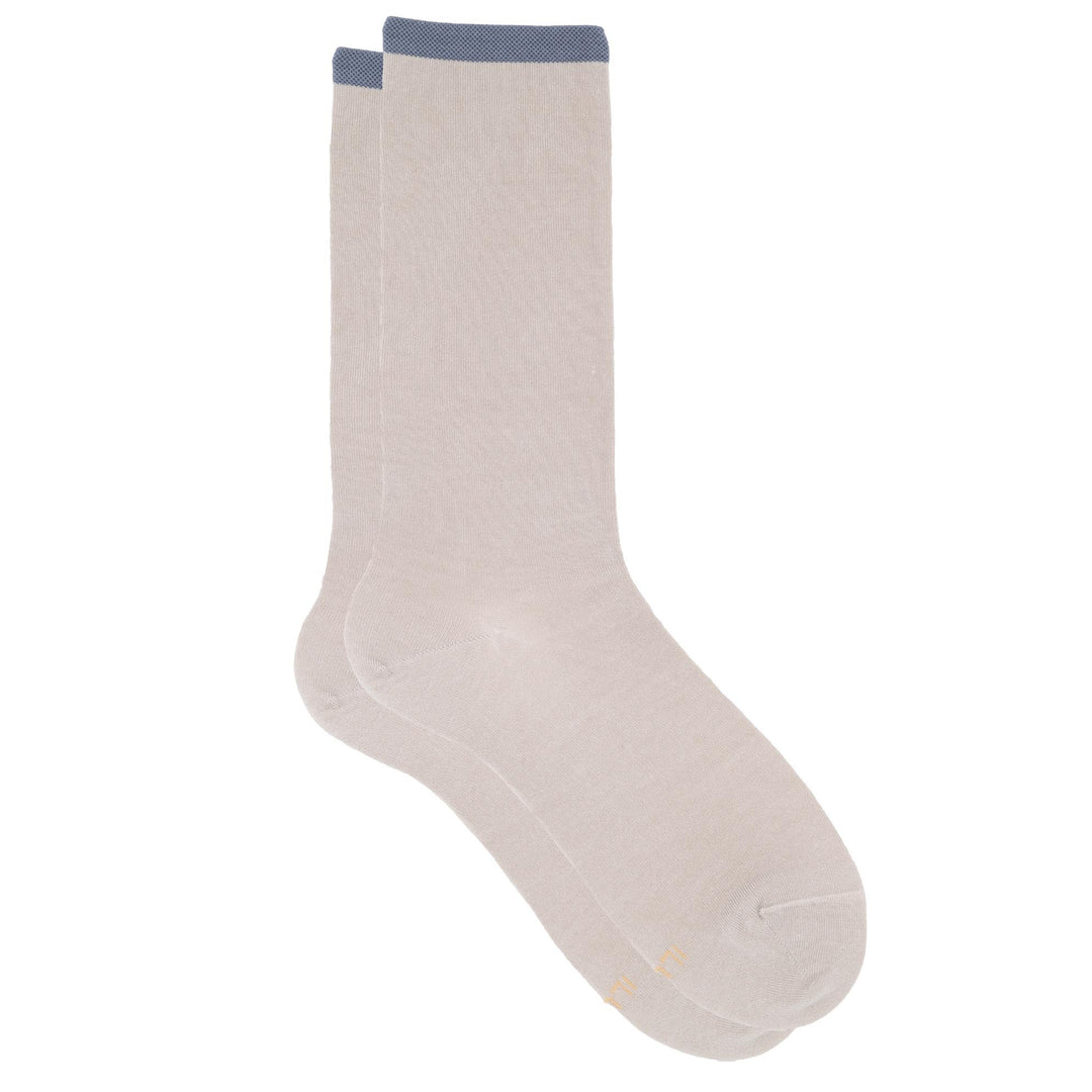 Beige sock with blue trim on a white background