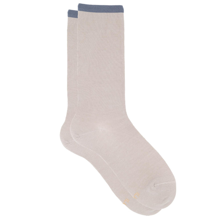 Beige sock with blue trim on a white background