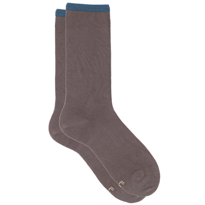 Pair of brown socks with blue accents on a white background