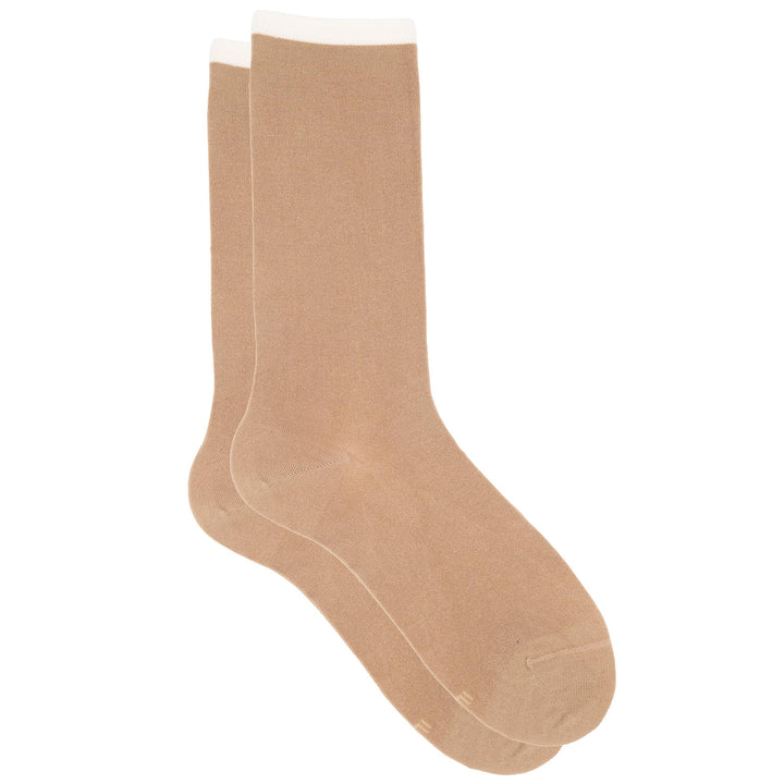 Pair of beige socks on a white background