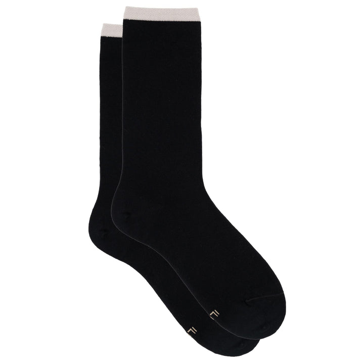 Black socks with white toes on a white background