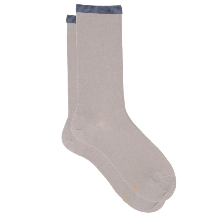 Pair of light gray socks with a blue top on a white background