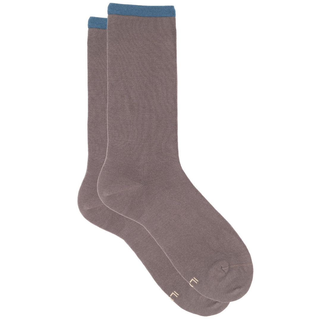 Pair of gray socks with blue accents on a white background