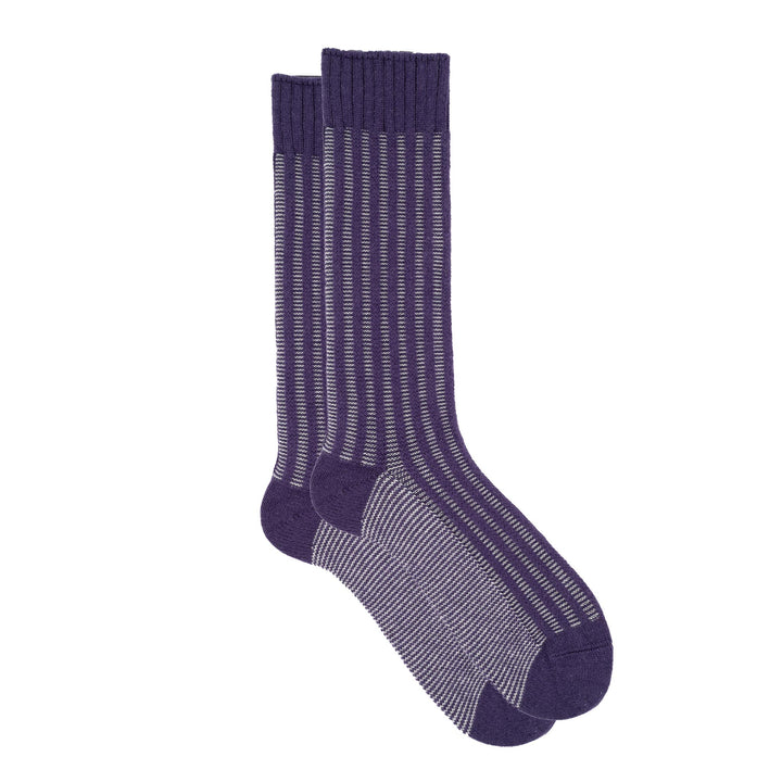 Purple and white striped socks on a white background