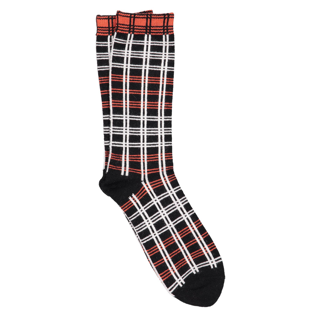 A pair of black socks with white background