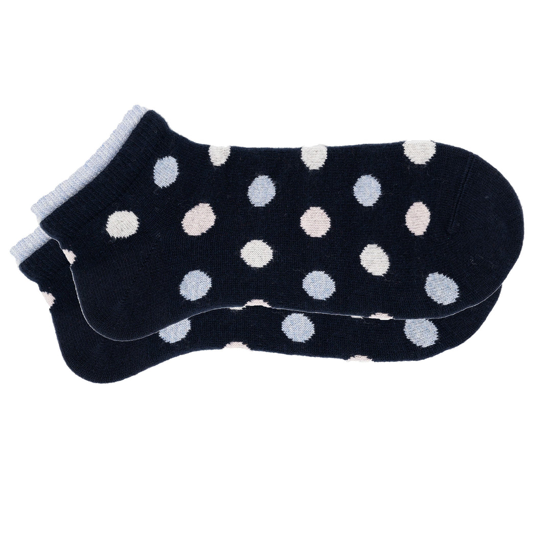 A pair of blue cashmere silk dotted sneaker socks with a seamless toe and hand-linked design.